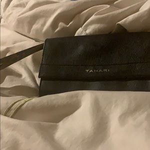 Taheri clutch with small coin leopard insert.